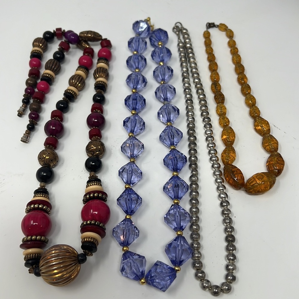 Four beautiful vintage necklaces